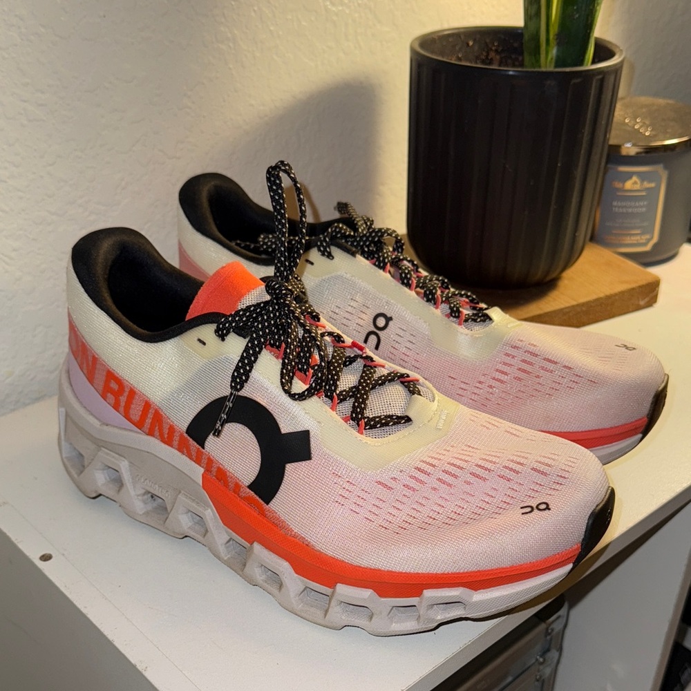 On Running White and Coral Athletic Shoes